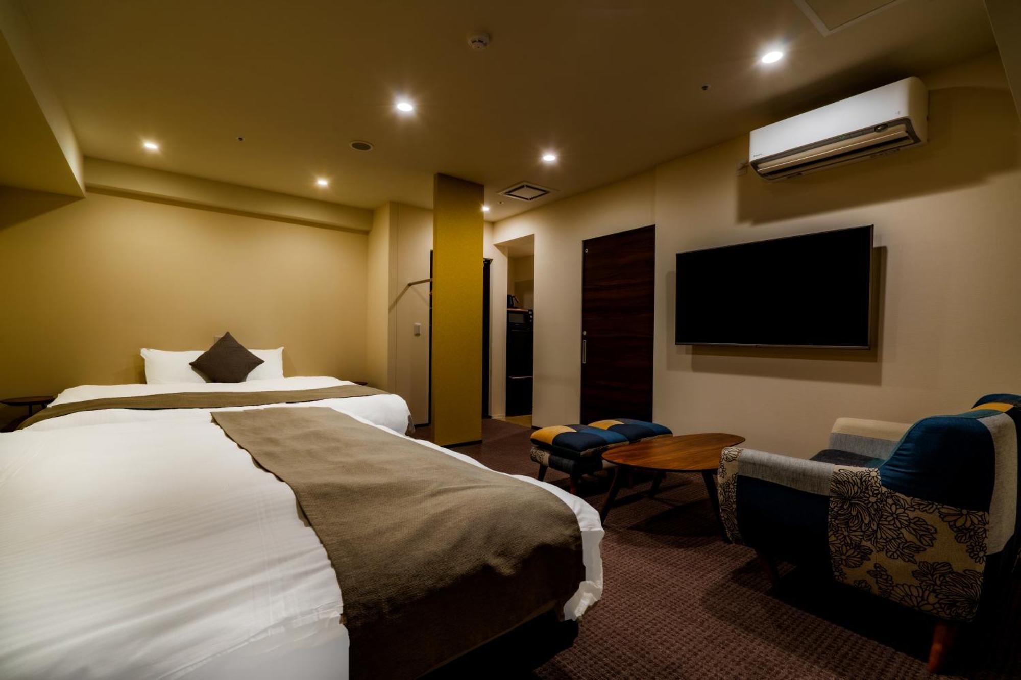 Randor Hotel Sapporo Suites Cameră foto A room at the hotel