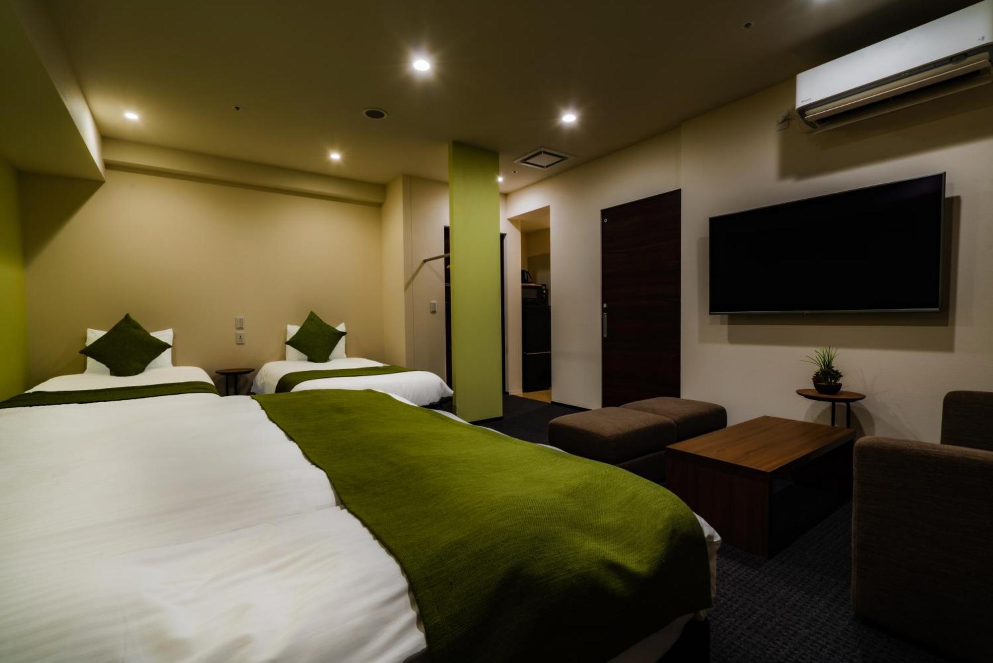 Randor Hotel Sapporo Suites Cameră foto A room at the hotel