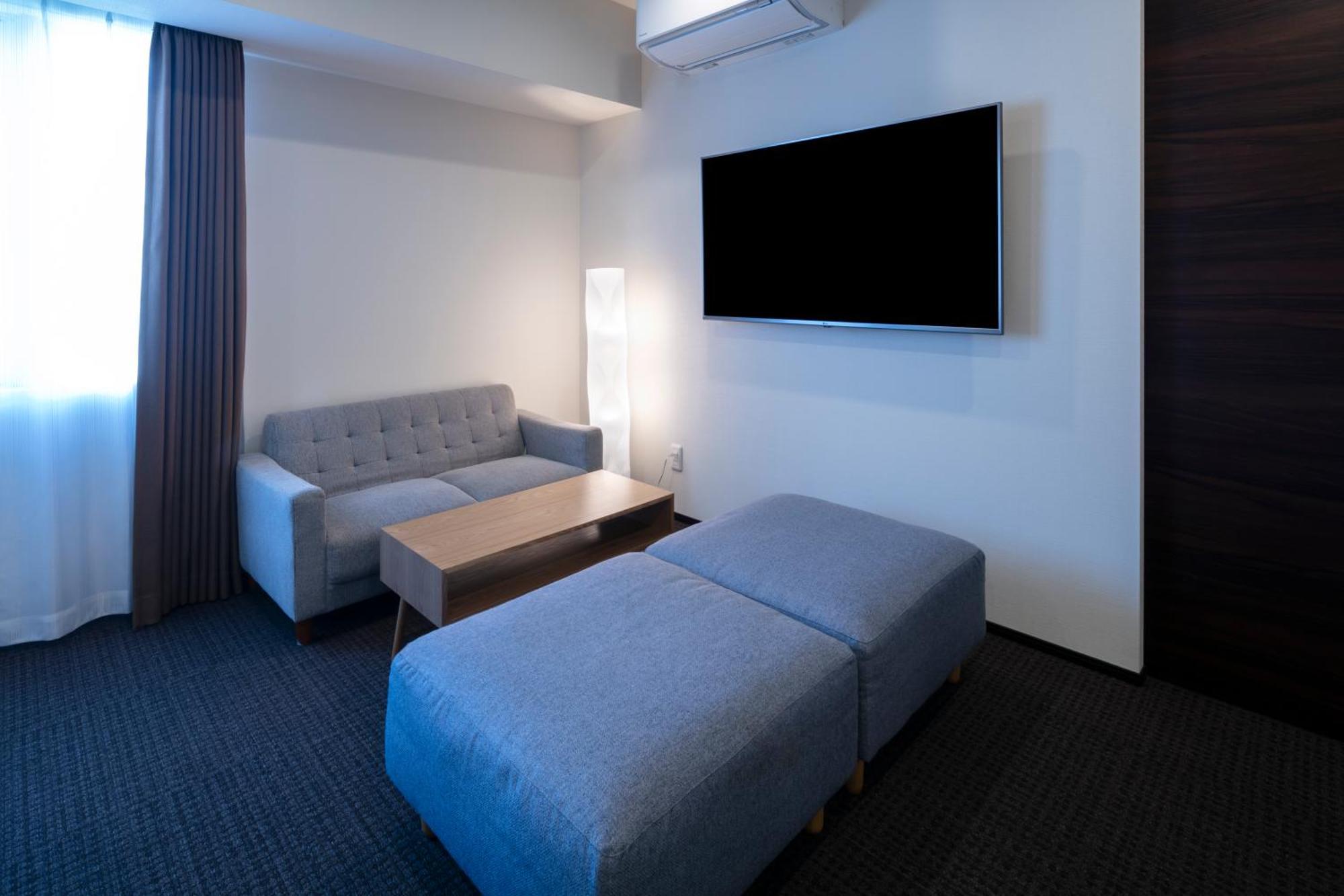 Randor Hotel Sapporo Suites Cameră foto A room at the hotel