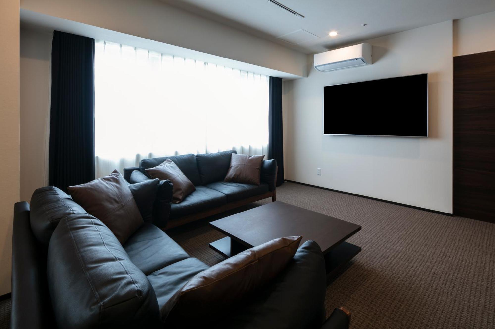 Randor Hotel Sapporo Suites Cameră foto A living room in a Japanese apartment