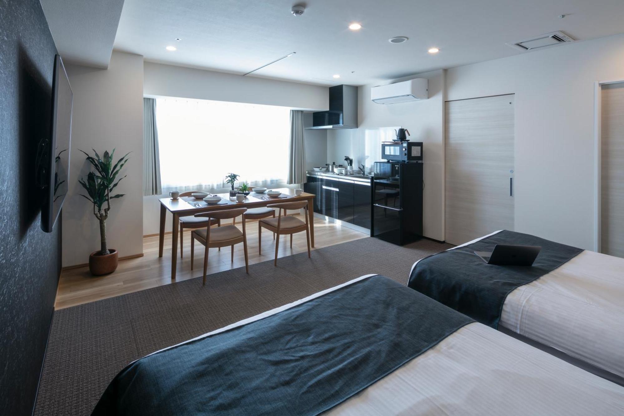 Randor Hotel Sapporo Suites Cameră foto A typical studio apartment in Japan