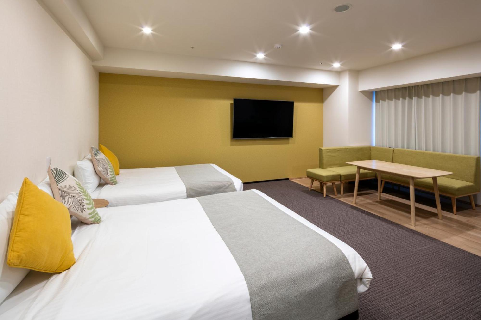 Randor Hotel Sapporo Suites Cameră foto A room at the hotel