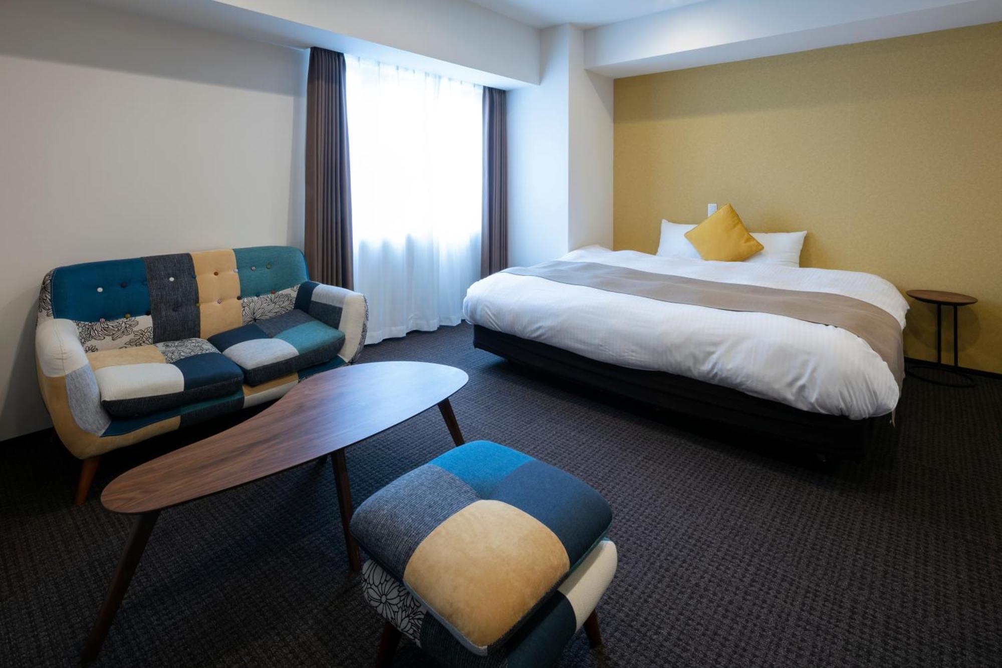 Randor Hotel Sapporo Suites Cameră foto A room at the hotel