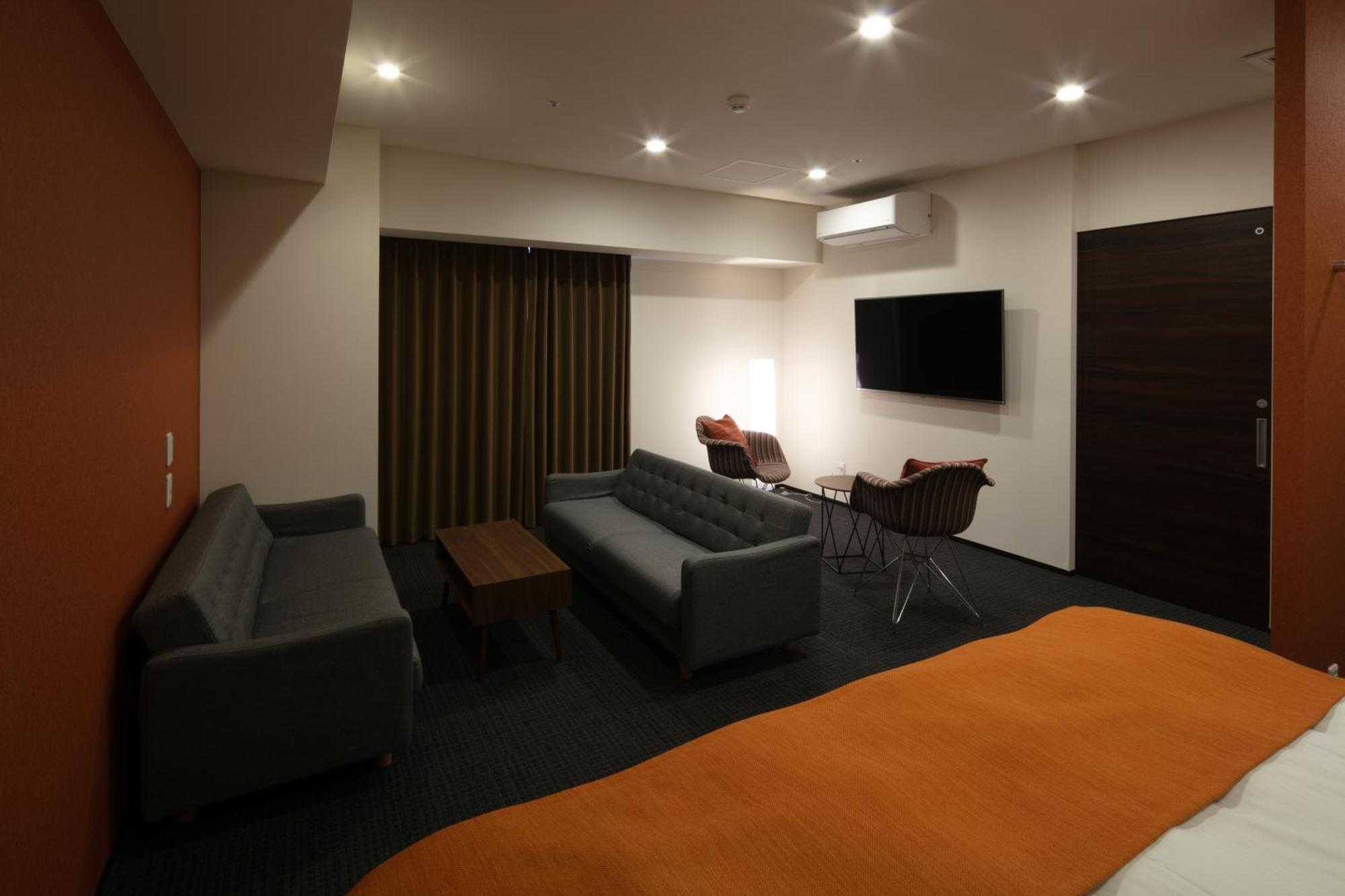 Randor Hotel Sapporo Suites Cameră foto A room at the hotel