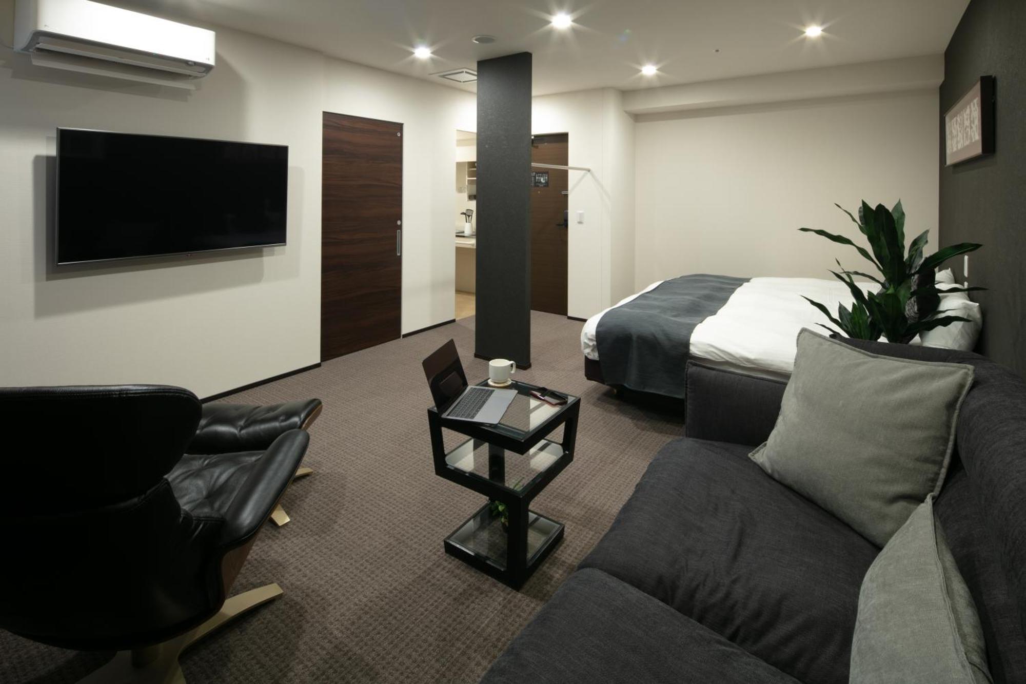 Randor Hotel Sapporo Suites Cameră foto A room at the hotel