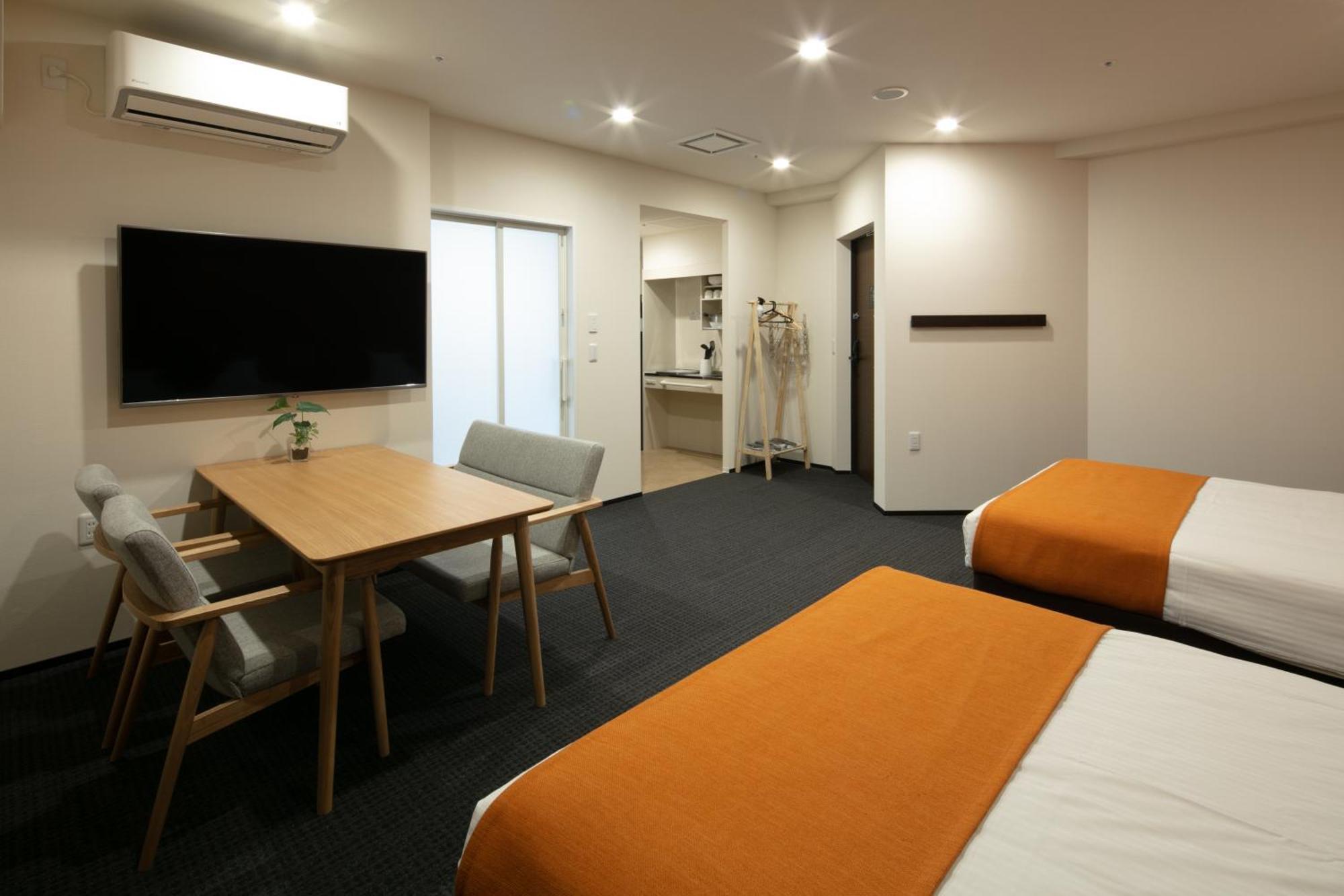 Randor Hotel Sapporo Suites Cameră foto A typical room at the hotel
