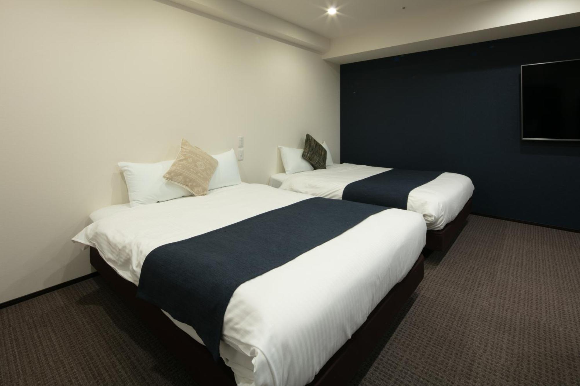 Randor Hotel Sapporo Suites Cameră foto A room at the hotel