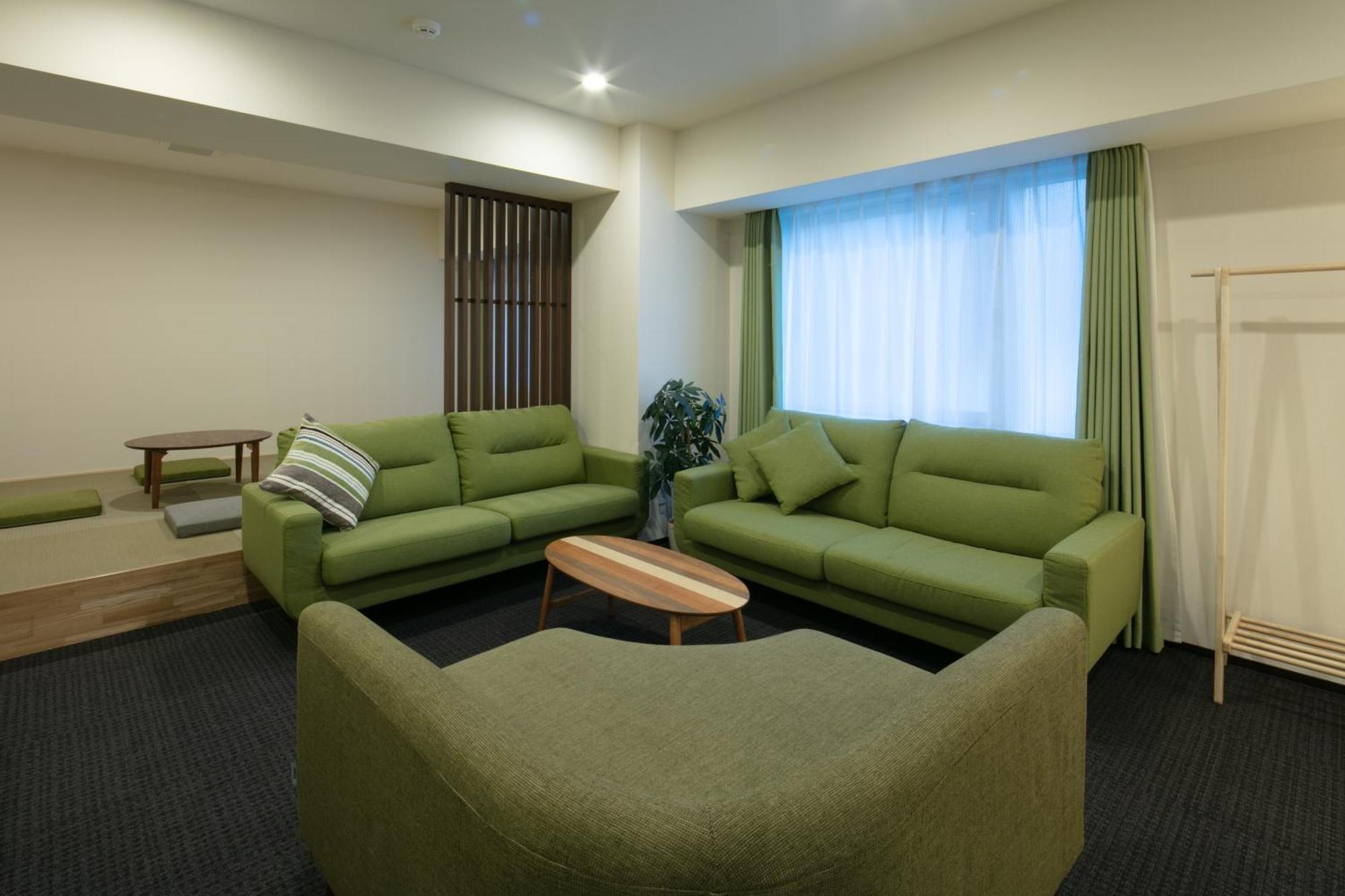 Randor Hotel Sapporo Suites Cameră foto A living room in a typical Japanese apartment